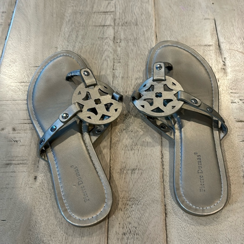 Gray/silver flip flops